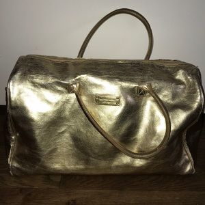 RARE MICHAEL KORS GOLD DUFFLE BAG